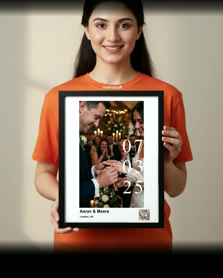A phone scans the QR code in the corner of a framed print, then the photo plays as a video on the phone screen